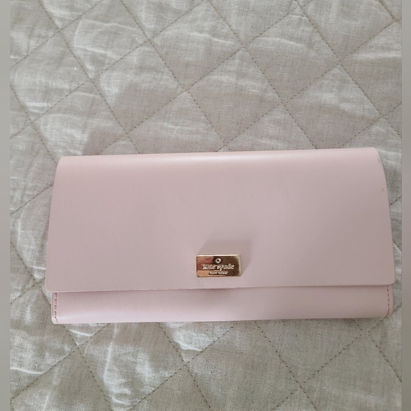 kate spade Handbags - Kate Spade Soft Pink Clutch with Gold Accent